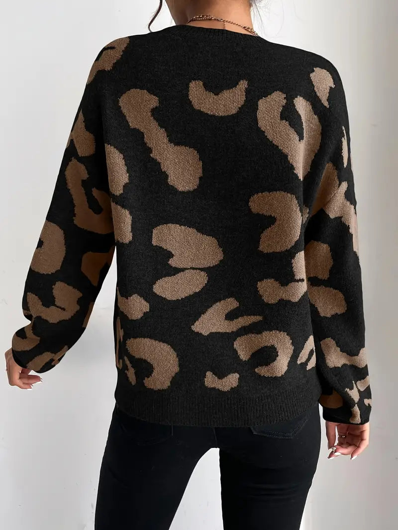 Eleganter Pullover mit Rundhalsausschnitt und Geparden-Print und fließenden Glockenärmeln