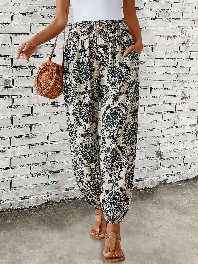 Jeni - Boho-Chic-Hose mit gesmokter Taille und ethnischem Grafikdruck