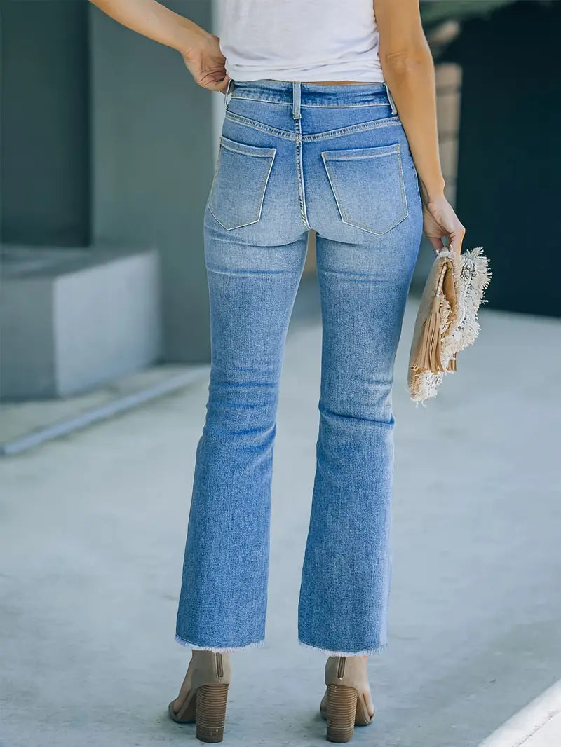 Lässige Jeans mit ausgewaschenem Knopfleiste und Fransenbesatz und ausgestelltem Bein