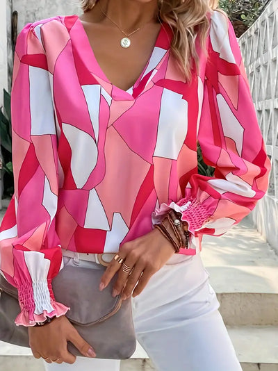 Geometrisch bedruckte Colorblock-Bluse mit V-Ausschnitt