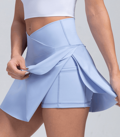 V-Taille plissierter Tennisrock mit Taschen